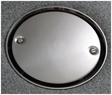 Round stainless wet room floor drain cover suitable for a vinyl floor covering