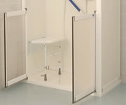Three sided low access shower cubicle with half height shower doors