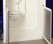 Shower toilet wall hung WC pan facilitates easy cleaning. Half height shower doors make carer assistance easy.