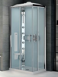 Offset corner shower cubicle with corner entry via two sliding doors