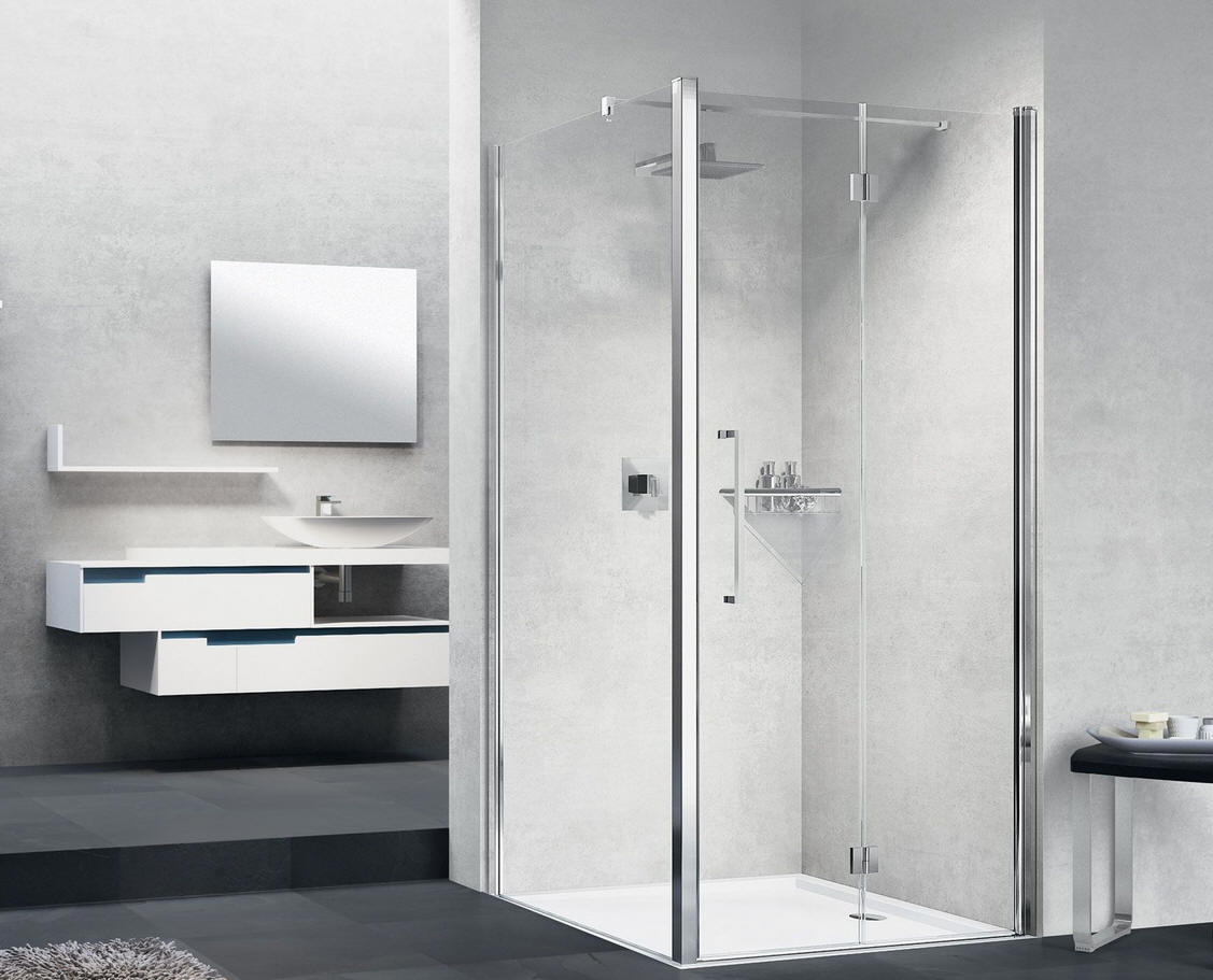 Novellini YOUNG 1BS bi-fold shower door in a corner setting with a fixed side panel.