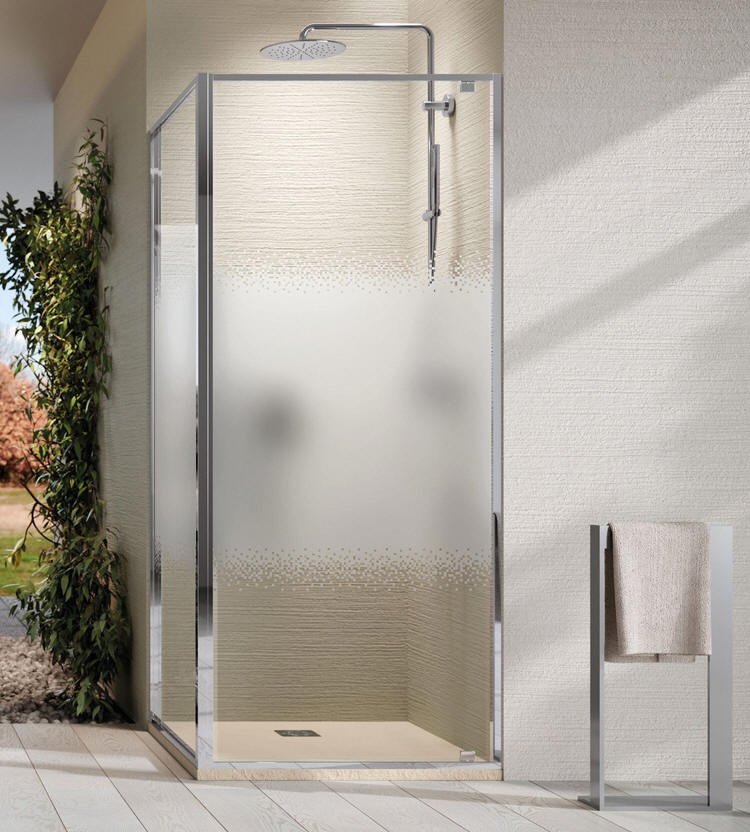 Novellini RIGA G pivot shower door in a corner setting - Chrome finish with Rose 1 printing modesty glass